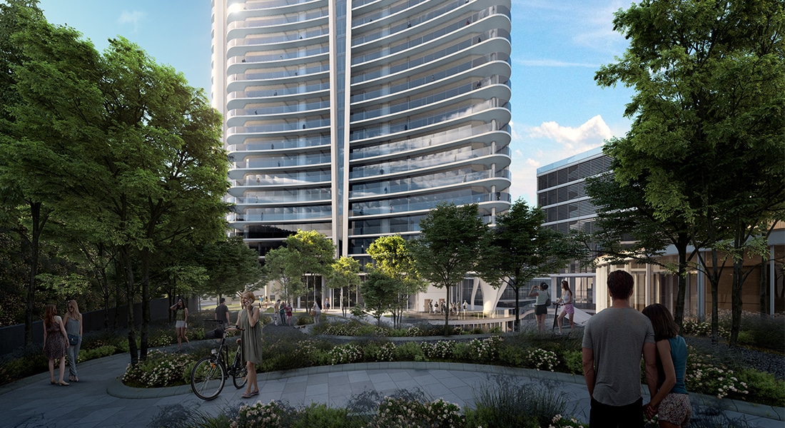 Modern building surrounded by greenery.